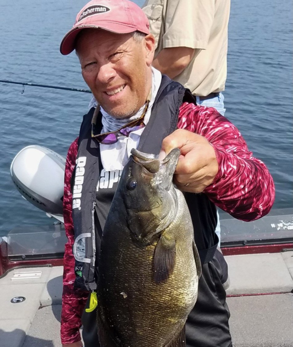 Chris Beeksma with Smallmouth Bass - ProStaff Fishing for Two Brothers Innovations